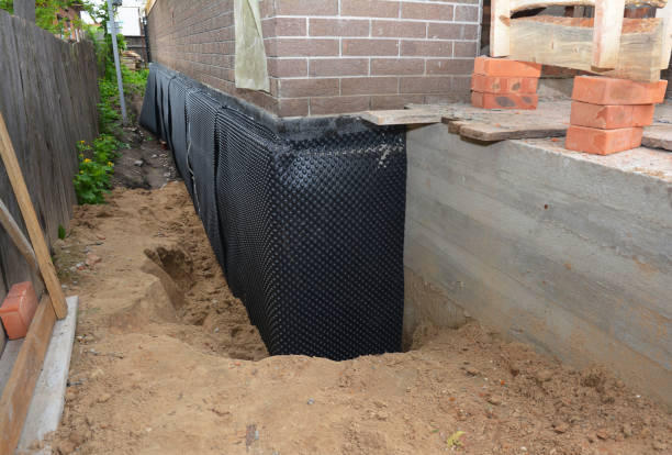 SJ Waterproofing Pros technician performing targeted Sump Pump Installation assessment in Dickson, TN